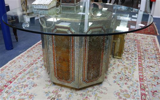 An Rodolfo Dubarry brass, white metal and copper overlaid glass top centre table, W.4ft 11in.